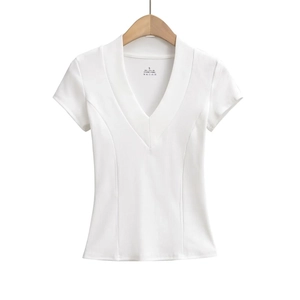 Detail of white V-neck slim tee showing ribbed fabric texture and princess seams