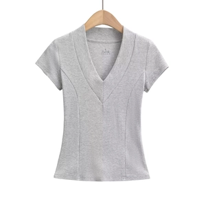 Detail of grey V-neck T-shirt with ribbed texture and fabric composition label