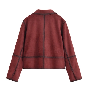 Detail view of burgundy suede jacket back showing contrast stitching and high-end texture