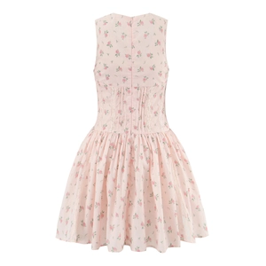 Detail view of pink floral dress back showing invisible zipper and lace patchwork detail