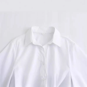 White cotton poplin long sleeve shirt with lapel collar and button-up front detailing
