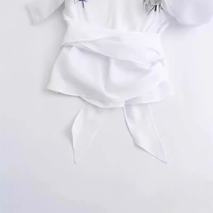 Minimalist white poplin shirt with lapel collar and wrap-around bow tie detail