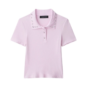 Detail of pink knit polo shirt featuring sparkling rhinestone embellishments on the collar