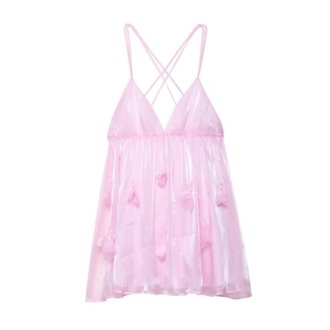 Detail of pink metallic camisole with 3D floral petals and deep V-neckline