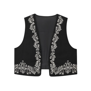 Women's black cropped waistcoat with intricate white floral vine embroidery on cotton fabric