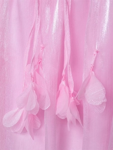Close-up of shimmering light pink fabric with 3D floral petal tassels and metallic sheen