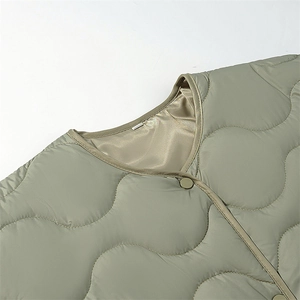 Olive green quilted cotton jacket with wave stitching and snap buttons for women