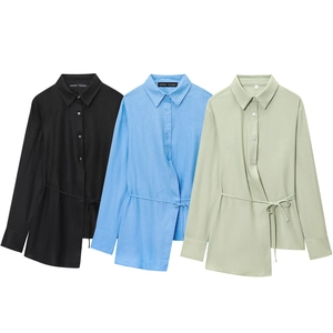 Women's long sleeve wrap shirts in black, blue, and green with asymmetric tie waist
