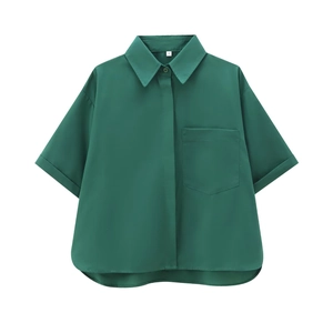 Macro view of dark green poplin shirt with pointed collar and hidden button placket
