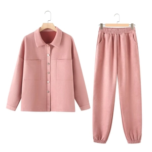 Pink faux suede two-piece set featuring a button-down shirt and elastic waist jogger pants