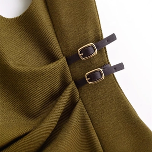 Women's olive sleeveless dress featuring side faux leather buckles and pleated details