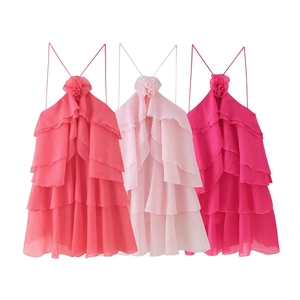 Women's tiered ruffle mini dress with halter neck and 3D floral accent in vibrant colors