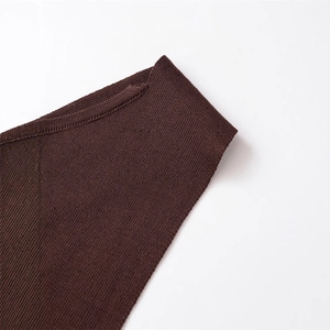Close-up of coffee brown knit sweater featuring ribbed neckline and fine texture detail