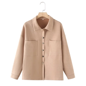 Detail view of khaki faux suede shirt jacket featuring classic lapel and cargo pockets