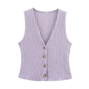 Detailed view of lavender V-neck vest with textured pleated fabric and wood-style buttons