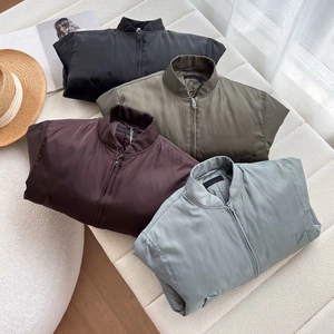 Minimalist loose-fit bomber jacket with stand collar and side pockets in four colors