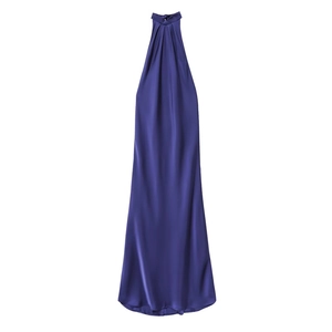 Detail view of the elegant pleated halter neckline and silky satin texture of the blue dress
