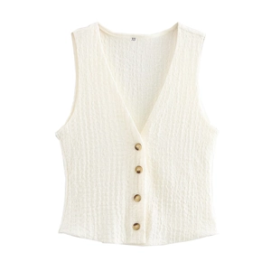 Close-up of cream sleeveless vest featuring V-neck and unique pleated fabric texture