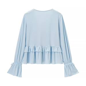 Light blue long sleeve chiffon blouse with elegant ruffle hem and bow tie cuffs detail