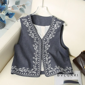 Vintage gray V-neck denim vest for women with white floral embroidery and linen texture