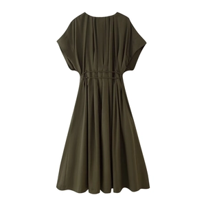 Detail of V-neck pleated waist dress in olive green with tie-belt and flowy skirt