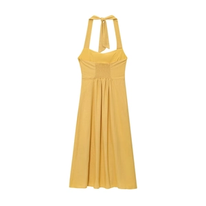 Détail de la robe licou jaune montrant le dos élastique froncé et le ruban à nouer