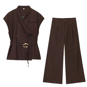Chocolate brown two-piece set featuring sleeveless vest with gold buckle and wide-leg pants
