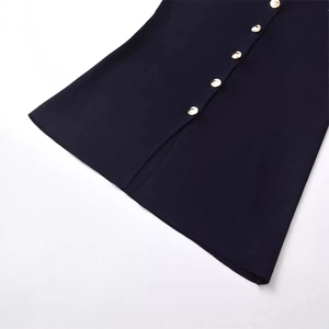 Navy blue ribbed knit vest featuring elegant single-breasted gold buttons for women