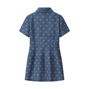 Rear view of denim dress with white bow prints and tailored waist stitching details