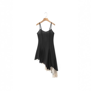 Black sleeveless camisole dress with asymmetric hem and cream ruffle layered detail
