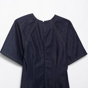 Deep navy denim maxi dress with contrasting yellow stitching and invisible back zipper