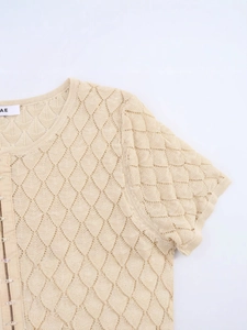 Short sleeve apricot knit cardigan with hollow diamond pattern and hook-and-eye closure