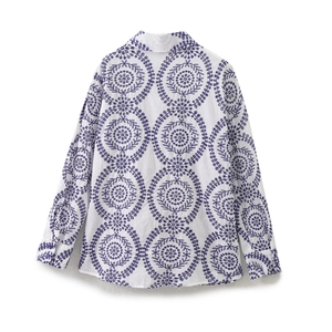 Detail view of white shirt back featuring purple mandala floral embroidery and buttoned cuffs