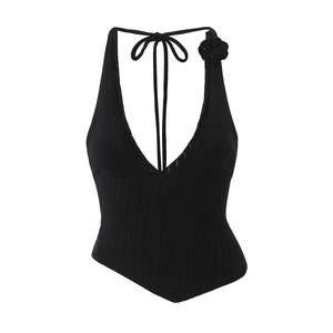 Sexy black deep V-neck halter top with knit flower detail and asymmetrical hemline