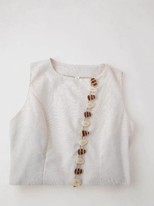 Chic beige sleeveless round neck vest with decorative wood-grain buttons for women
