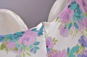 Detail of hidden zipper on floral summer dress with heart-shaped neckline and soft lining