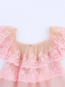 Pink mesh off-shoulder top with floral lace layers and ruffle trim details