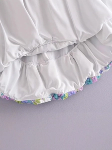 French vintage floral puff sleeve dress in white with purple floral ruffle hem detail