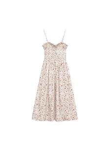 Floral backless summer dress with spaghetti straps and smocked bodice in white