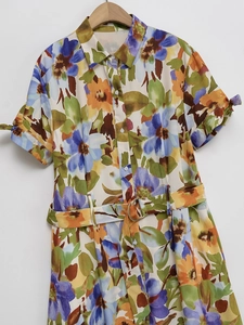 Elegant floral print shirt dress with short sleeves and matching waist belt for summer