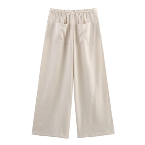 Detail view of high waist wide-leg pants in beige cotton-linen with elastic back pockets