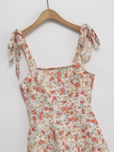 Floral print summer slip dress in apricot with adjustable shoulder tie straps