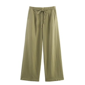Detail of high waist elastic waistband with drawstring on olive green wide leg trousers