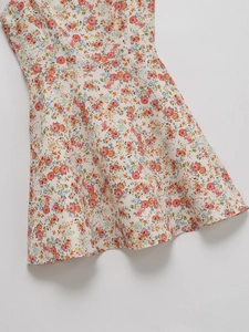 Floral print summer mini dress in cream white with adjustable spaghetti straps and A-line cut