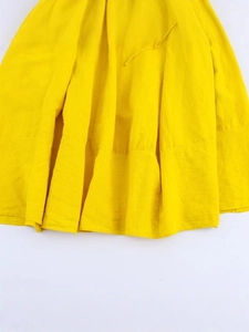 Elegant French style backless summer dress in vibrant yellow linen textured fabric