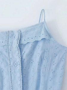 Light blue backless summer dress with floral eyelet embroidery and button details