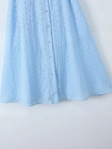 Light blue backless French summer dress with floral embroidery and button detail