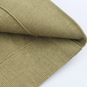 Macro shot showing the high-density knit texture and khaki fabric grain of these wide-leg pants