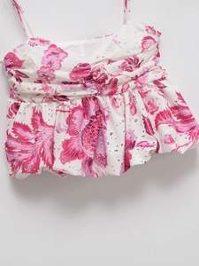 Floral embroidery eyelet camisole with sweet pink flowers and ruffled hem details