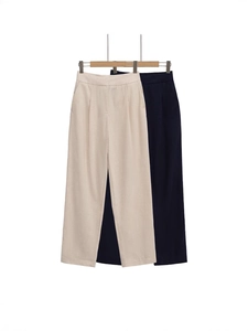 Pantalon large taille haute pour femme en beige et noir avec détails de plis élégants